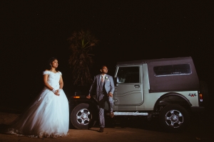 bride and groom with thar jeep in a wedding couples session